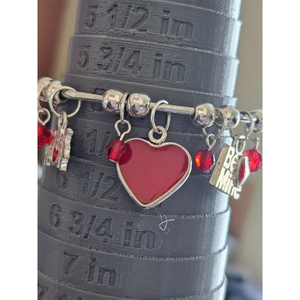 Child's silver tone valentine bracelet 6